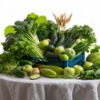 Variety of green vegetables and fruits in a crate on the table