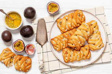 Canvas Print - passion fruit puff pastry turnovers on a plate