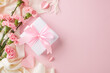 Mother's day elegance: white gift box with pink ribbon among carnations on a pastel background
