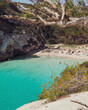 Views of Macarelleta beach. Turquoise mediterranean waters on Menorca in balearic islands in Spain