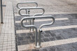 © varbenov - Bicycle rack bollards closeup in city street