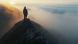Mountain top with mans silhouette, early morning mist, serene, telephoto perspective
