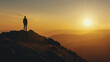 © PARALOGIA - Silhouette of a man on high mountain, golden hour light, clear sky, wide shot