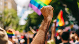 Fototapeta  - man protests with raised fist on gay pride day