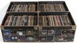 Vintage vinyl record collection in old storage boxes. Weathered vinyl. Concept of music archives, analog storage, and audio nostalgia. White background