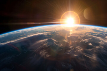 Wall Mural - view of blue planet Earth from space with sun setting over horizon, sunrise