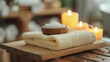 close-up of clean towels and lighted candles at a spa, me-time