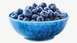 Fresh blueberries in a blue bowl, perfect for food and nutrition concepts