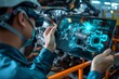 © alphaspirit - Safety gear-clad professional analyzes engine hologram using ar diagnostics software