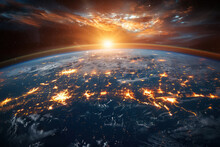 stunning sunrise from space showcasing earth’s atmosphere and illuminated cities below