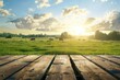 summer morning light over a grassy field with grazing cows farm landscape viewed from empty wooden table digital ilustration