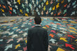 © grey - A businessman facing multiple arrows pointing in different directions, the concept of decision making