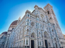 The Front Facade Of The Duomo In Florence
