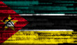 Flag of Mozambique on binary code. Modern technology concept
