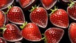 Background with glossy ripe strawberry pattern on black background