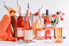 Collection Of Rose Wine Bottles And Wine Bucket With Two Coupe G