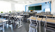 © xy - School classroom with desks and chairs