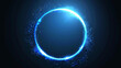 Radiant blue circle ring with glittering glow on black background
