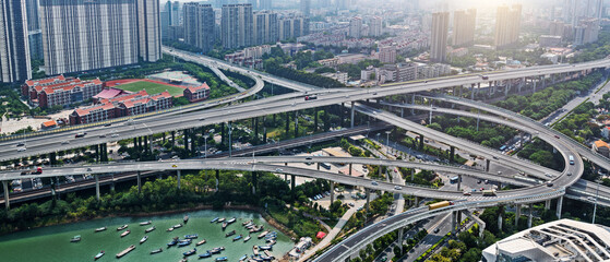 Wall Mural - Aerial of city overpasses and buildings