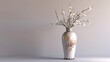 A tall, slender porcelain vase with a delicate cherry blossom design, filled with fresh sprigs of spring blossoms