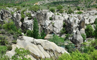 Beautiful view of a wonderful and majestic ancient cave city in summer on daytime