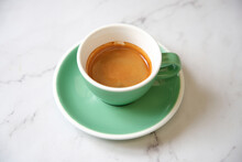 Espresso In Teal Cup On Marble Table