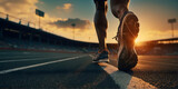 Fototapeta  - A focus on the shoes of an athlete running on a track