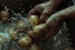 A person washing a bunch of potatoes with water. Suitable for cooking and food preparation concepts
