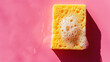 Top view of yellow sponge with soft soap foam on bright pink background. Housekeeping aesthetic concept. Generative AI