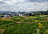 Fototapeta Na sufit - Aerial view of farmlands and towns in rural Yunnan Province in China