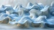   A tight shot of a blue-and-white object, its surface adorned with undulating wave patterns