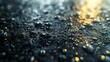   A tight shot of water droplets on a surface with a hazy, backlit scene