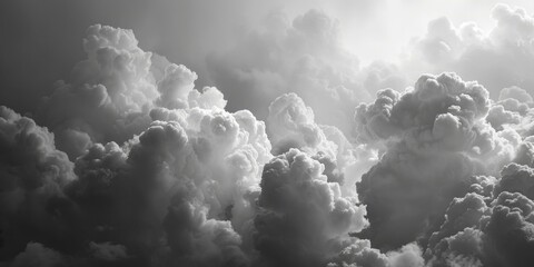 Canvas Print - A black and white photo of clouds in the sky. Suitable for various design projects