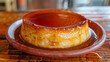 Close-up of a classic caramel-topped flan, a popular dessert in argentina