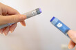 Woman hand holding two insulin pen. Diabetes type one