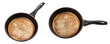 Two old empty frying pans isolated on a white background.