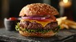 © BG_Illustrations - Gourmet Cheeseburger on Slate with Fresh Toppings and Sesame Bun