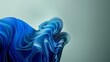 Wavy fabric sheets forming an abstract flowing shape. Widescreen blue background