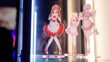 Three anime maid girl figures merchandise inside the glass cabinet lighted with LED strips