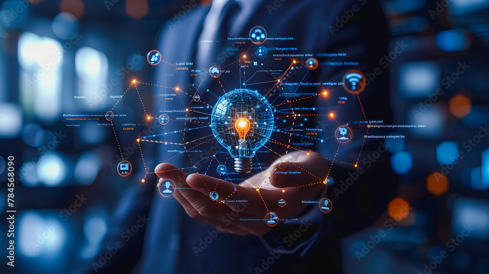 Business professional holding a glowing digital brain, representing ...