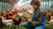© Александр Марченко - female farmer with a tablet stands among chickens