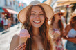 Happy attractive women eating ice cream walking outside in a sunny day