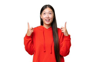 Wall Mural - Young Asian woman over isolated background with headache