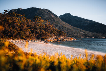 Wall Mural - sunrise sunset aerial view of wineglass bay beach and mount amos. freycinet park, tasmania, australi