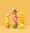 Creative layout made of grapefruit, orange fruit and lemon on the yellow background. Food concept. Macro concept.