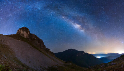 Wall Mural - Beautiful milky way and mountain peak. Dark blue starry sky.