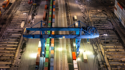 Wall Mural - RTG cranes are lifting containers at the port.