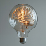 Fototapeta  - Brain light bulb human brain glowing inside of light bulb. Conceptual symbol of idea and insight