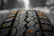 Close-Up of Wet Tire Tread Pattern with Raindrops