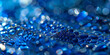 Sparkling Blue Water Droplets on Reflective Surface